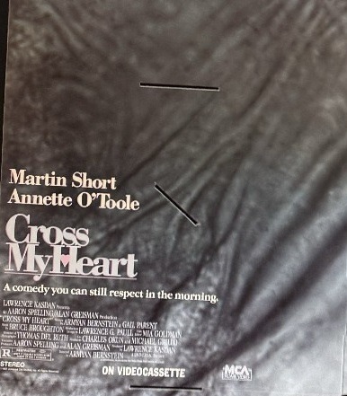 Actual Cross My Heart — MCA Home Video promo folder front photograph
